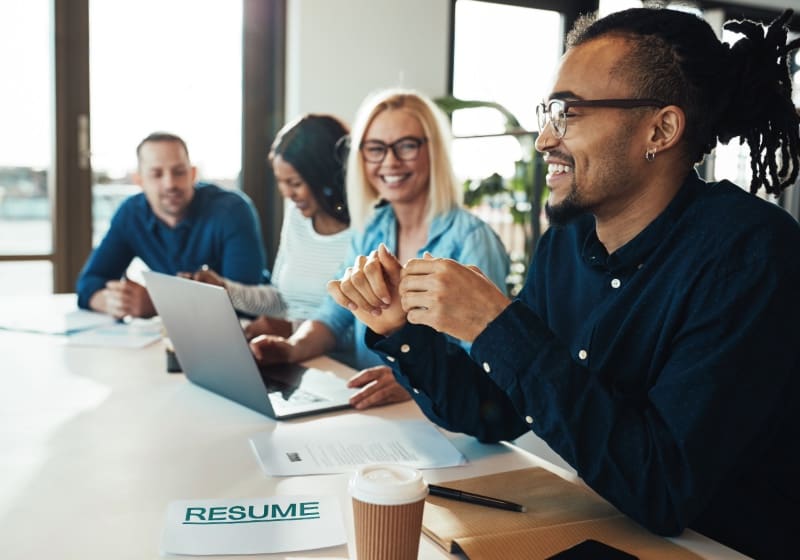 hiring managers reviewing resumes